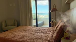 Apto c Varanda, Piscina e Salão de Jogos