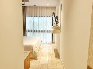 Acogedor y lujoso 1BD a pasos del mar y 5ta av