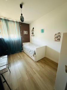 Appartements Grand Appartement ANTONY : photos des chambres