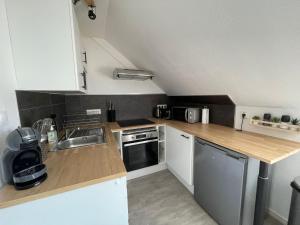 Appartements LE SAINT LOUIS Dijon : photos des chambres