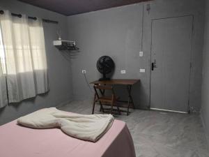 Quarto em lugar tranquilo e bem localizado