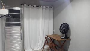 Quarto em lugar tranquilo e bem localizado