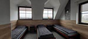 Pokoje Gościnne z łazienkami przy Wrocławiu, darmowy parking