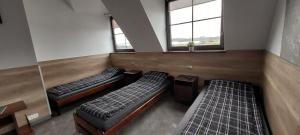 Pokoje Gościnne z łazienkami przy Wrocławiu, darmowy parking