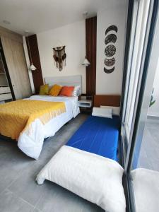 Modern suite steps from the sea