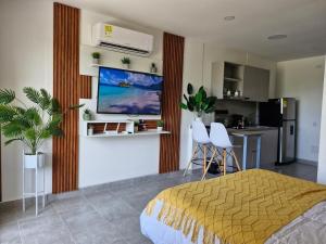 Modern suite steps from the sea