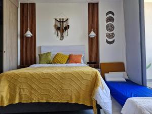 Modern suite steps from the sea