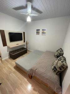 Apartamento próximo a praia com ar condicionado