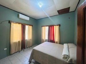 Cozy house, close to the beach in Tulian Campo