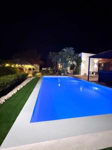 Las palmeras con piscina