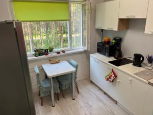 Korter ümbritsetud metsaga