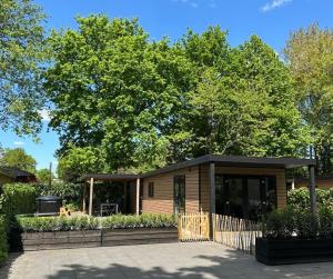 Schitterend 6 persoons chalet met HOTTUB aan de bossen van Putten