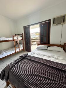 POUSADA OHANA, SUITES ao LADO DO SESC BERTIOGA, e PROXIMO A PRAIA