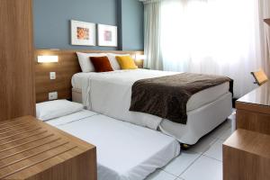 Verano Stay suíte com garagem, wi-fi 400 MB, Barra Olímpica