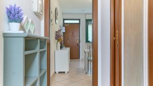 App 8 Accogliente Bilocale con Giardino