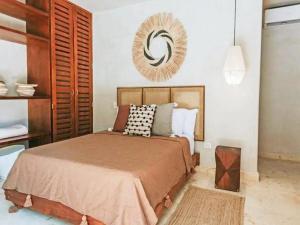 Boho-Chic Villa with 4 Bedrooms & 5 Bathrooms in Exclusive Playacar Phase 2