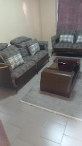 chambre salons balcon chez Aboua - Ubytování bez kategorie ve městě Darou Rhamane