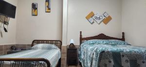 Área de Lazer com quartos e cozinha aberta na Chácara Refrigerio