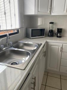 Bonita Casa Centrica a 10 min del malecon