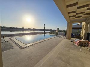 Villa at Cyan Ring with infinity pool at lagoon