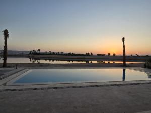Villa at Cyan Ring with infinity pool at lagoon