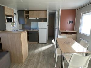 Mobil home avec terrasse à Guégon - API-1-52-558