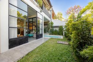 Designer Industrial Haven with Private Pool in Central Canggu