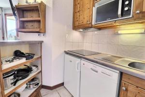 Résidence Grand Bois A - CONFORTABLE 2 PIECES + CABINE, SKIS AUX PIEDS ET PROCHE DES COMMERCES MAE-2024