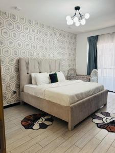 The comfort executive loft three bedroom apartment with amazing breathtaking city views , swimming pool ,gym ,private ample parking space with designated child playground area