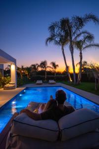 TAF Villas Beach Resort with Tesla