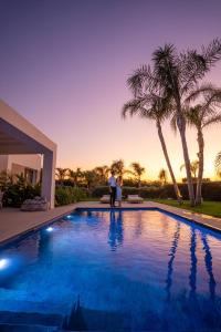 TAF Villas Beach Resort with Tesla