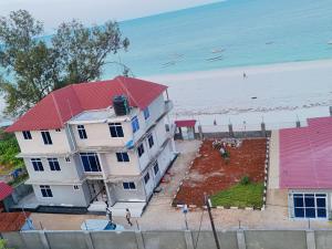 Uroa Ocean Escape - Stylish 2-Bedroom Apartment with Terrace & Sea Views