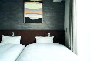 Rakuten STAY Kyoto Station Twin Room with ceiling projector