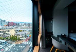 Rakuten STAY Kyoto Station Twin Room with ceiling projector