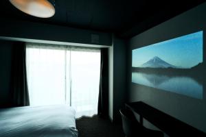 Rakuten STAY Kyoto Station Twin Room with ceiling projector