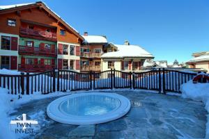 ARC 1950, Appartement 2 chambres 6 personnes, Skis aux pieds, Sauna, Hammam, Jacuzzi, Piscine intérieure et extérieure