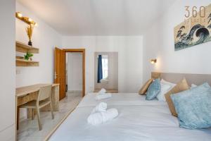 Beautiful seafront Suites with comfy beds, AC & WIFI by 360 Estates