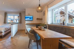 Dorfchalets - Appartement Rosi inkl Tauern Spa Eintritt & Sommerkarte