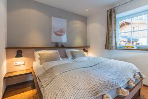 Dorfchalets - Appartement Rosi inkl Tauern Spa Therme Eintritt & Sommerkarte