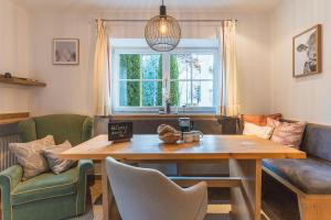 Dorfchalets - Appartement Rosi inkl Tauern Spa Therme Eintritt & Sommerkarte