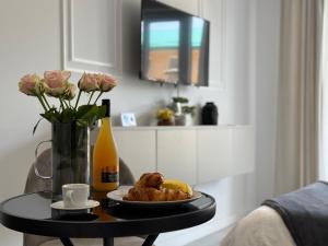 Pluto Studio w garden Cosmopolis