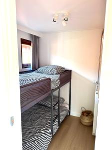 T Boshuusje Berg & Beek