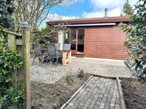 T Boshuusje Berg & Beek