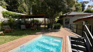 Casa 23 Floresta Boa Vista - 4 Suítes e Piscina Aquecida em Meio à Natureza