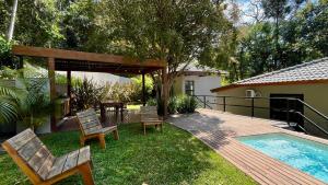 Casa 23 Floresta Boa Vista - 4 Suítes e Piscina Aquecida em Meio à Natureza