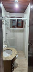 Próximo a Praia Grande, Apto com ar,garagem e Suíte