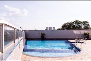 Loft aconchegante com varanda Campolim