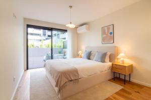 Gaia Elegant Apartment with Patio by LovelyStay