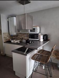 STUDIO Cosy rez de jardin climatisation parking wifi