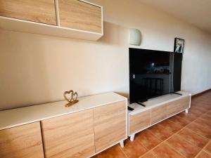 Neptuno Beachfront Retreat with smart TVs and Terrace